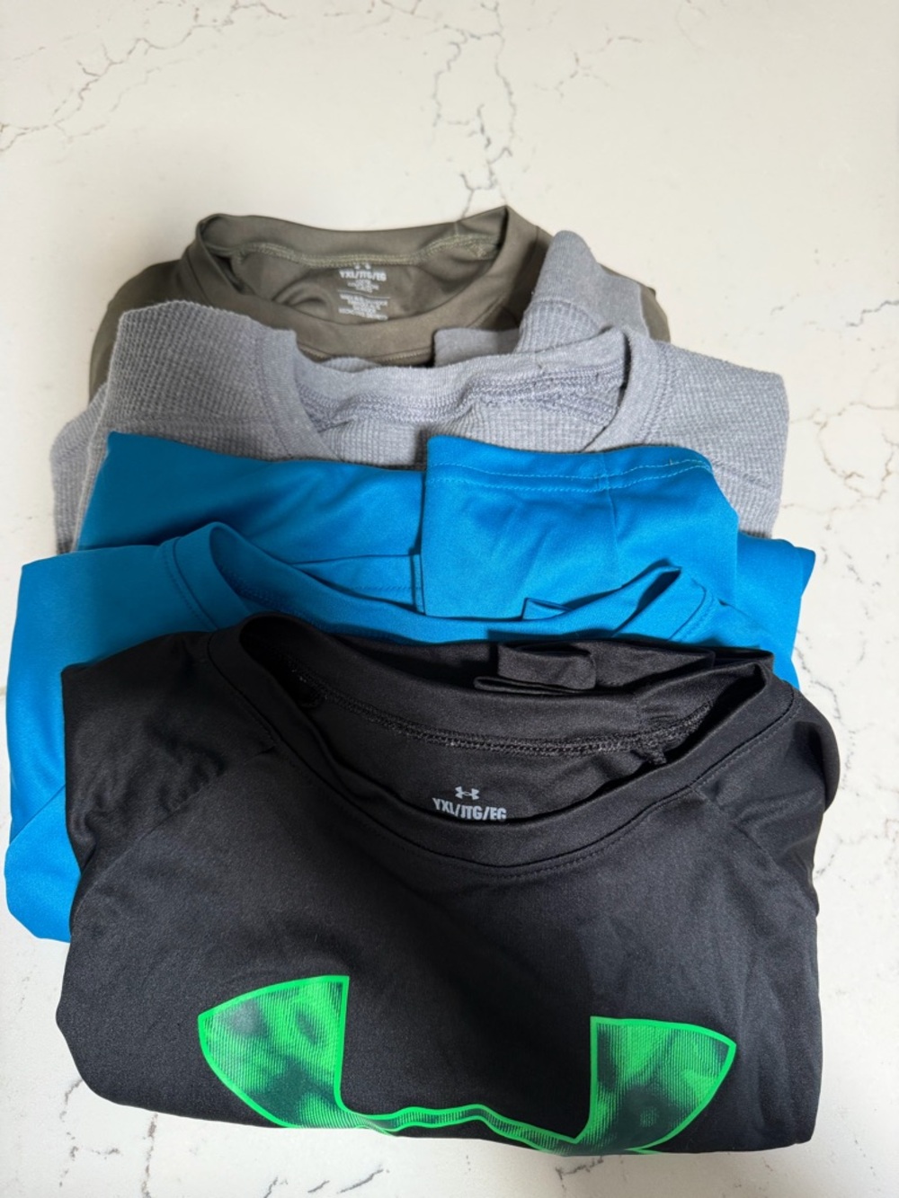 Lot of 4 Under Armour Performance long sleeved Tees with logo